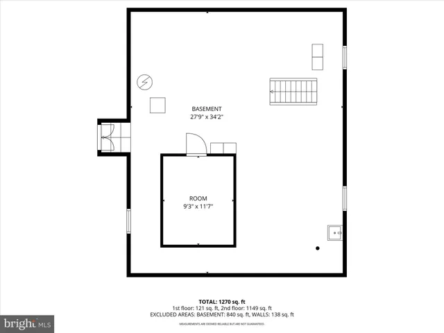 a picture of a bench in front of a wall