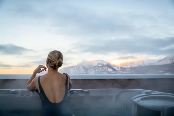 a living room with fireplace furniture and a fireplace
