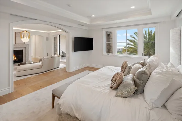 a spacious bathroom with a shower sink and mirror