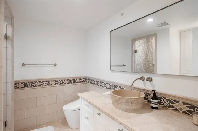 a view of a living room and dining room