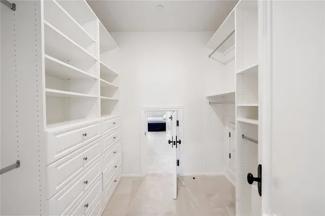 a room with gym equipment and a large window