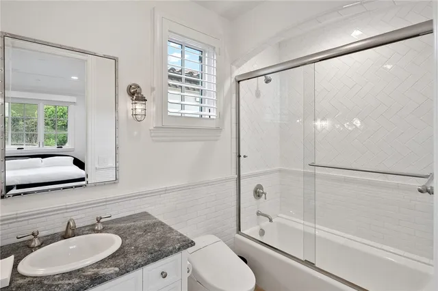a kitchen with a table and chairs