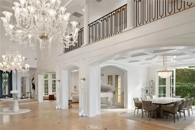 a room with furniture projector and screen