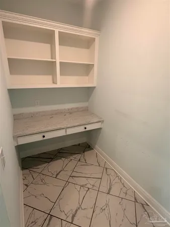 a view of a room with rack on the wall