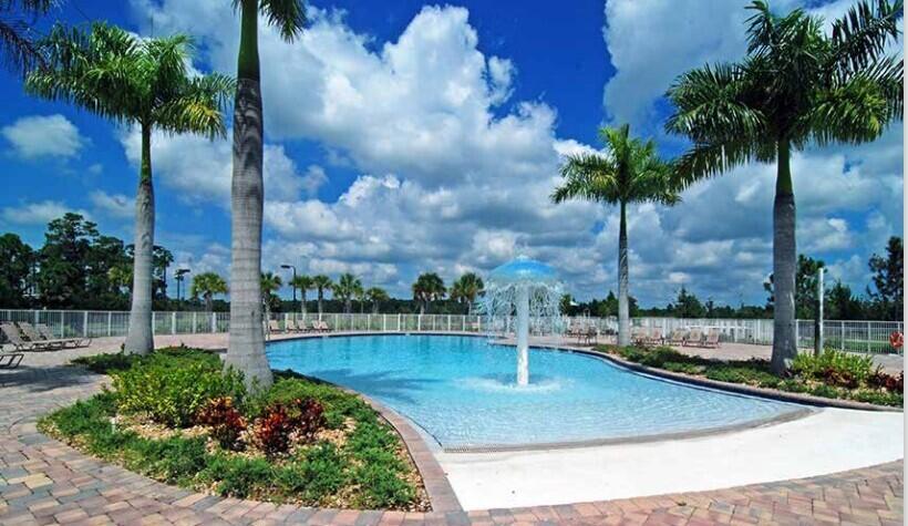 569 Seaspray Drive Fort Pierce, FL 34945 - Photo 21 of 28 a view of a swimming pool with a patio