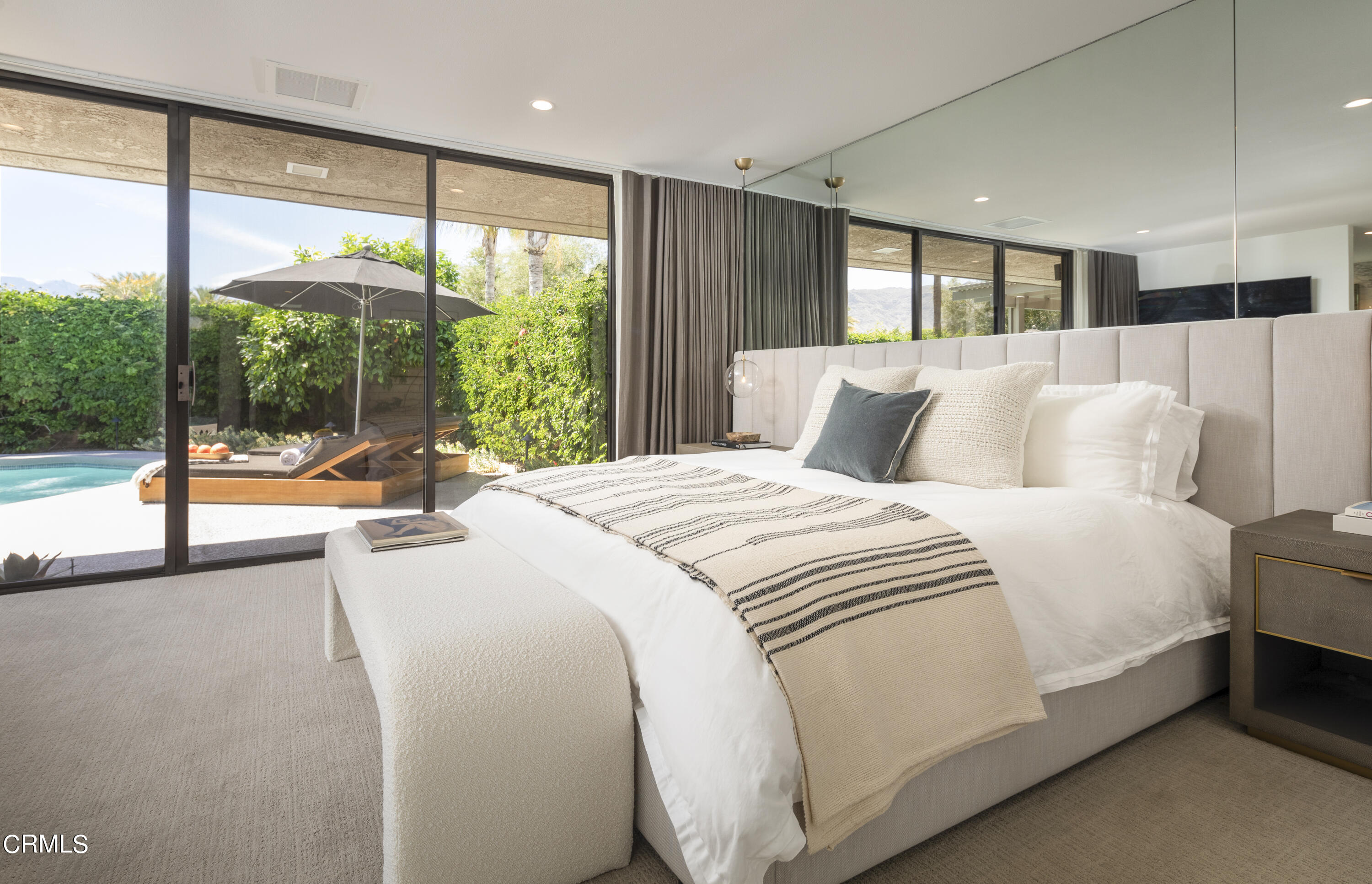 56 Princeton Drive Rancho Mirage, CA 92270 - Photo 14 of 35 a bed room with a bed and a large window