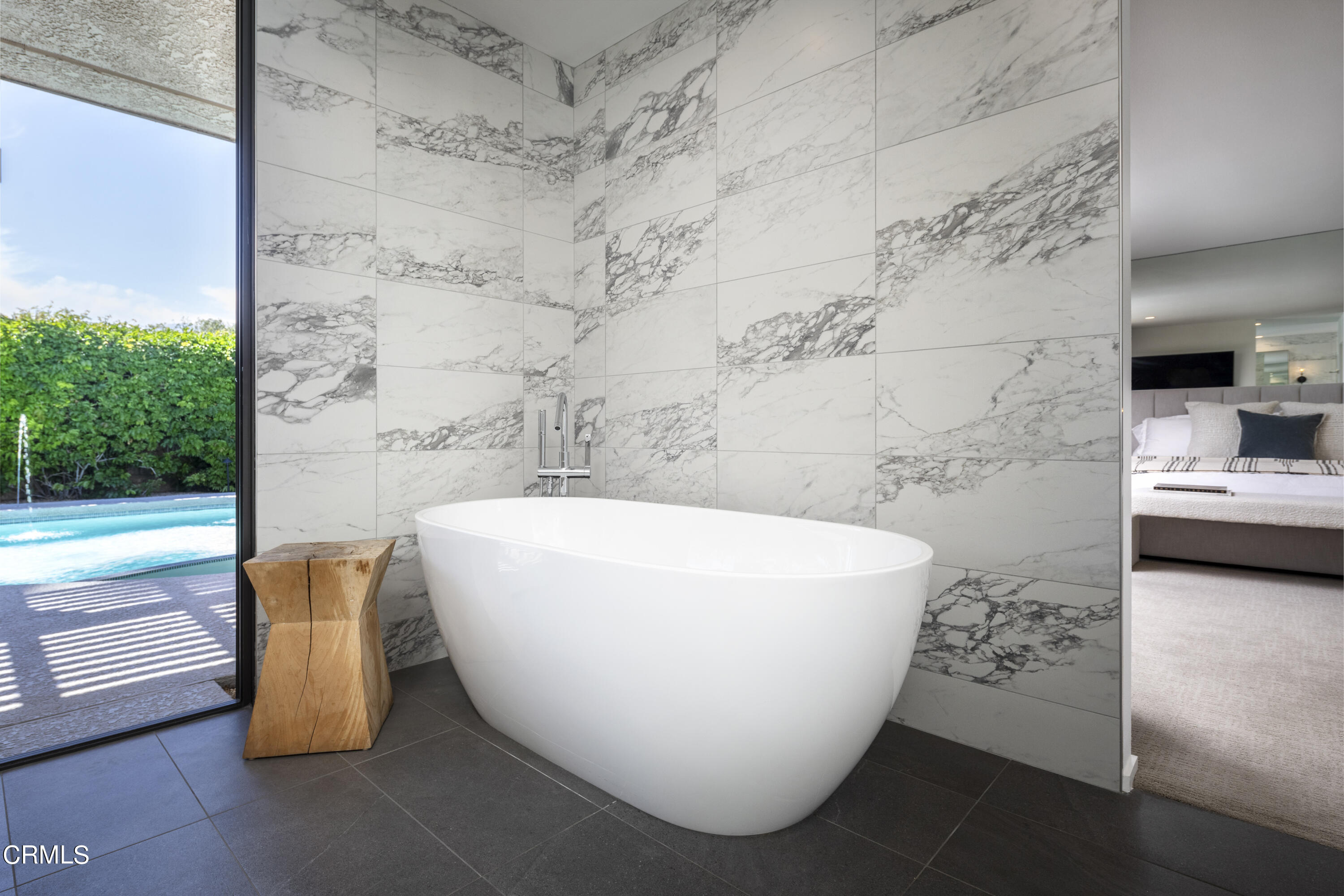 56 Princeton Drive Rancho Mirage, CA 92270 - Photo 19 of 35 a white tub sitting next to a white wall