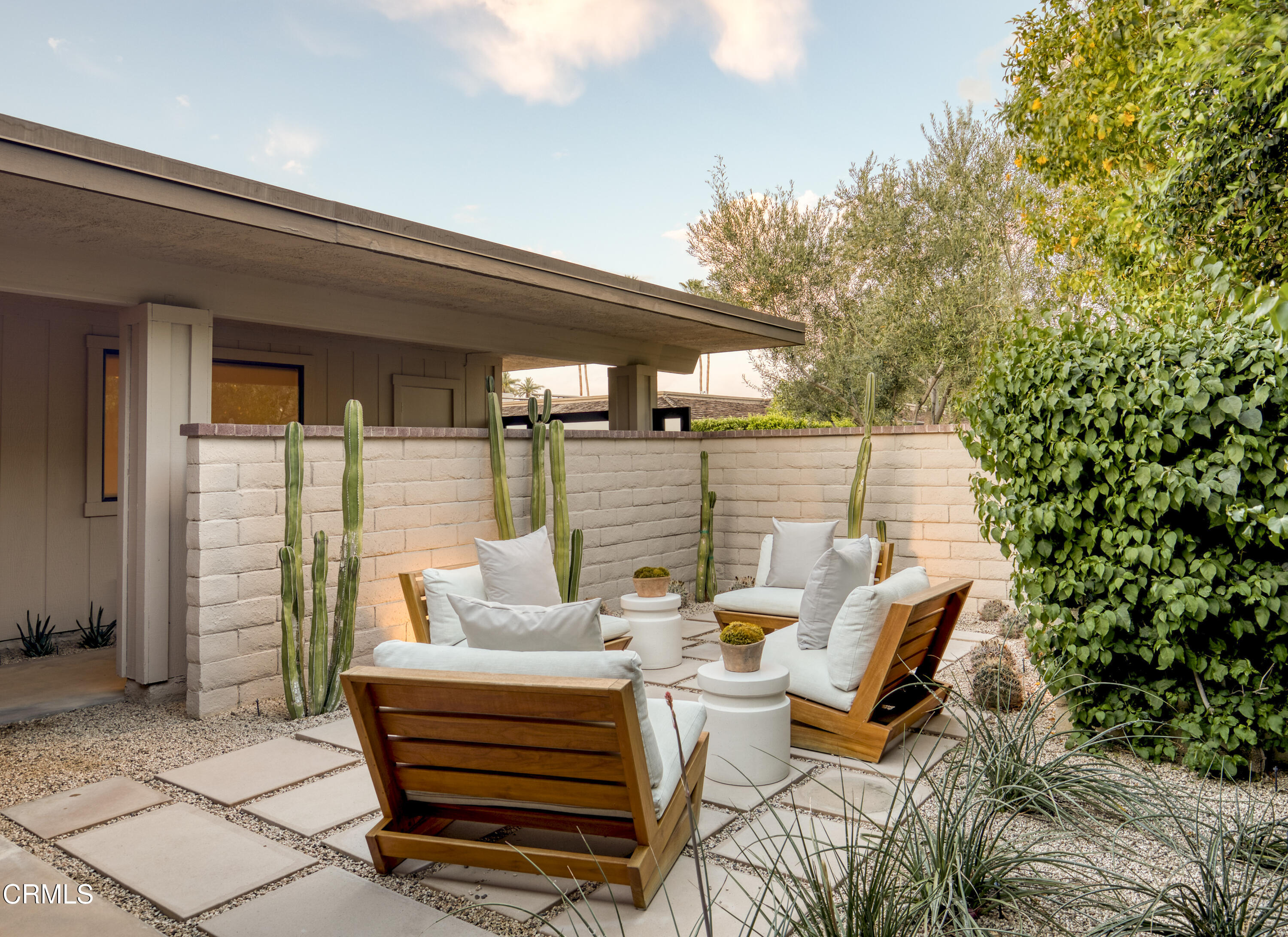 56 Princeton Drive Rancho Mirage, CA 92270 - Photo 28 of 35 a balcony with furniture and a potted plant