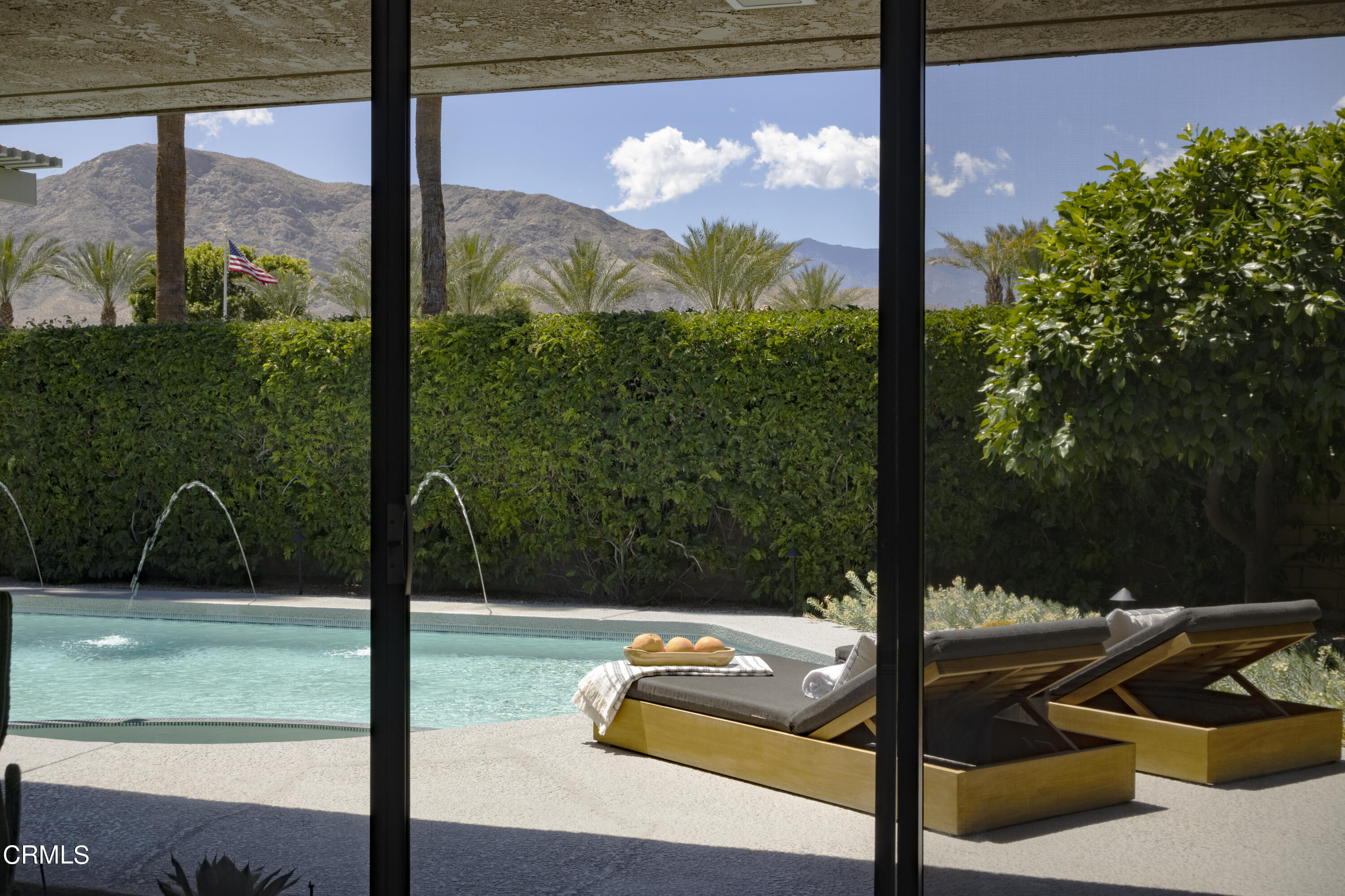 56 Princeton Drive Rancho Mirage, CA 92270 - Photo 3 of 35 a view of a street from a window