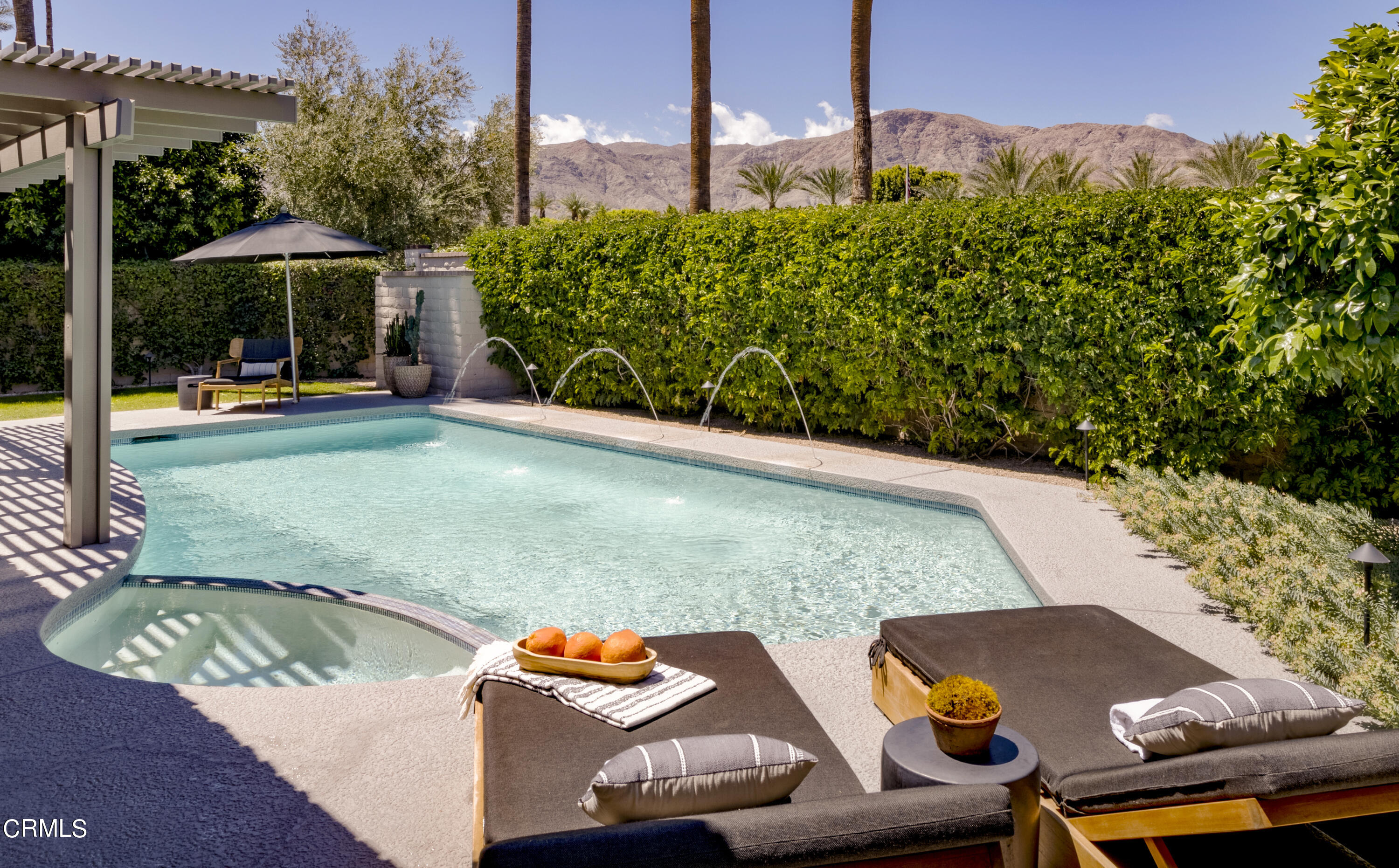 56 Princeton Drive Rancho Mirage, CA 92270 - Photo 4 of 35 an outdoor view of patio with swimming pool