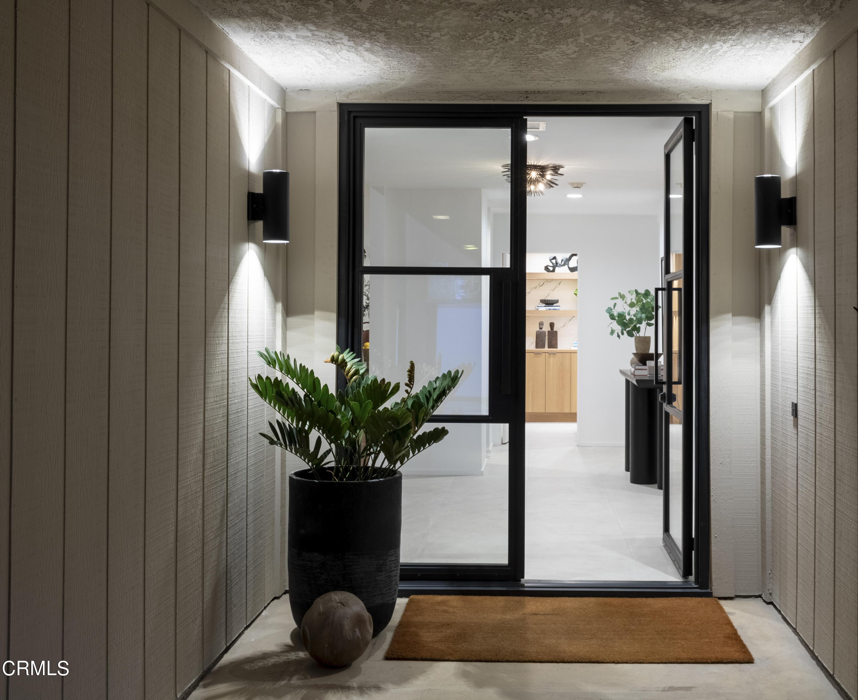 56 Princeton Drive Rancho Mirage, CA 92270 - Photo 5 of 35 a view of hallway with a potted plant