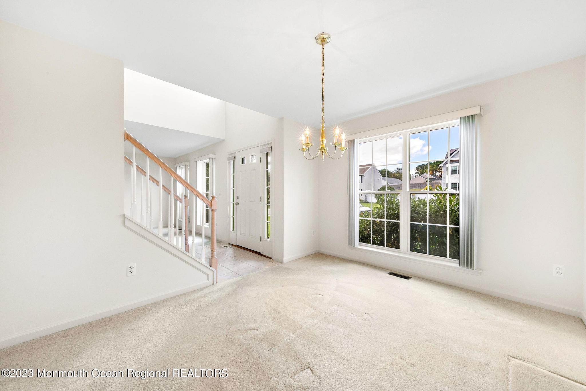 135 Barracuda Road Manahawkin, NJ 08050 - Photo 26 of 47 a view of an empty room with windows