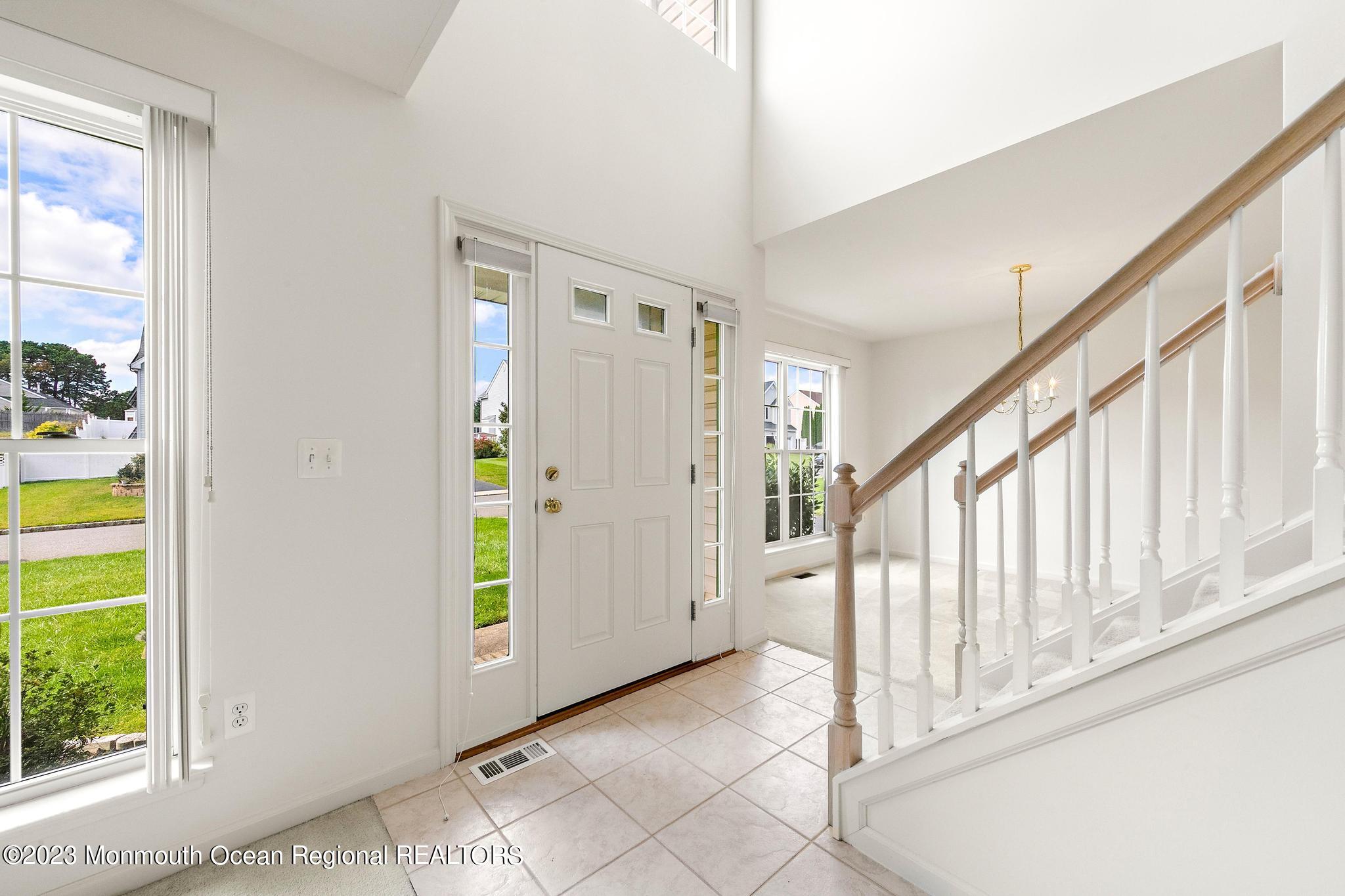 135 Barracuda Road Manahawkin, NJ 08050 - Photo 4 of 47 a view of an entryway with a swimming pool