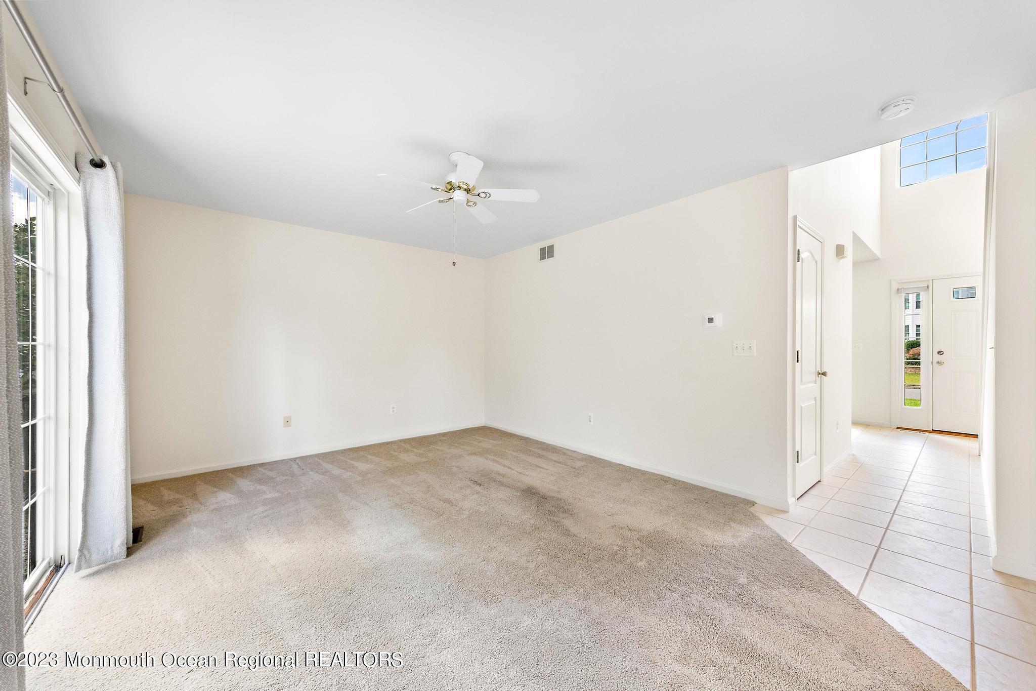 135 Barracuda Road Manahawkin, NJ 08050 - Photo 7 of 47 a view of an empty room