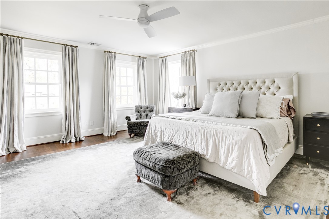 6 Berkshire Road Richmond, VA 23221 - Photo 35 of 66 a spacious bedroom with a bed a couch and windows