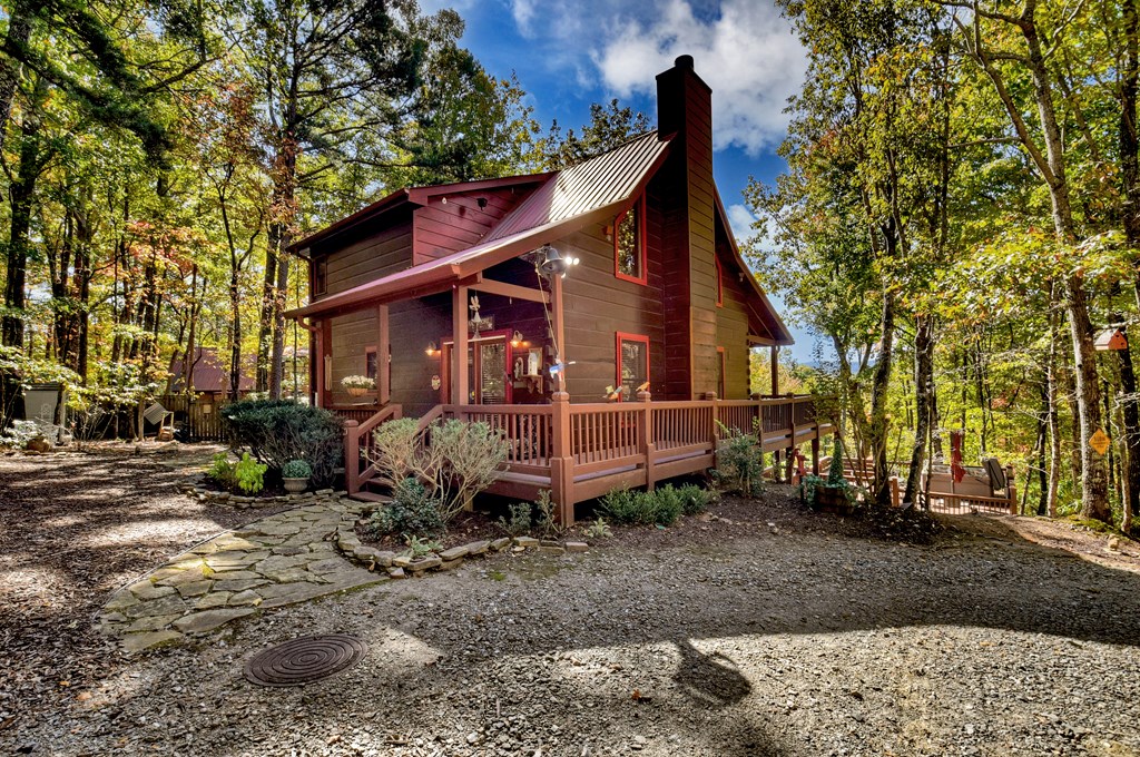 240 Lower Prince Mountain Road Cherry Log, GA 30522 - Photo 14 of 45 a view of a house with a yard siting area and large tree