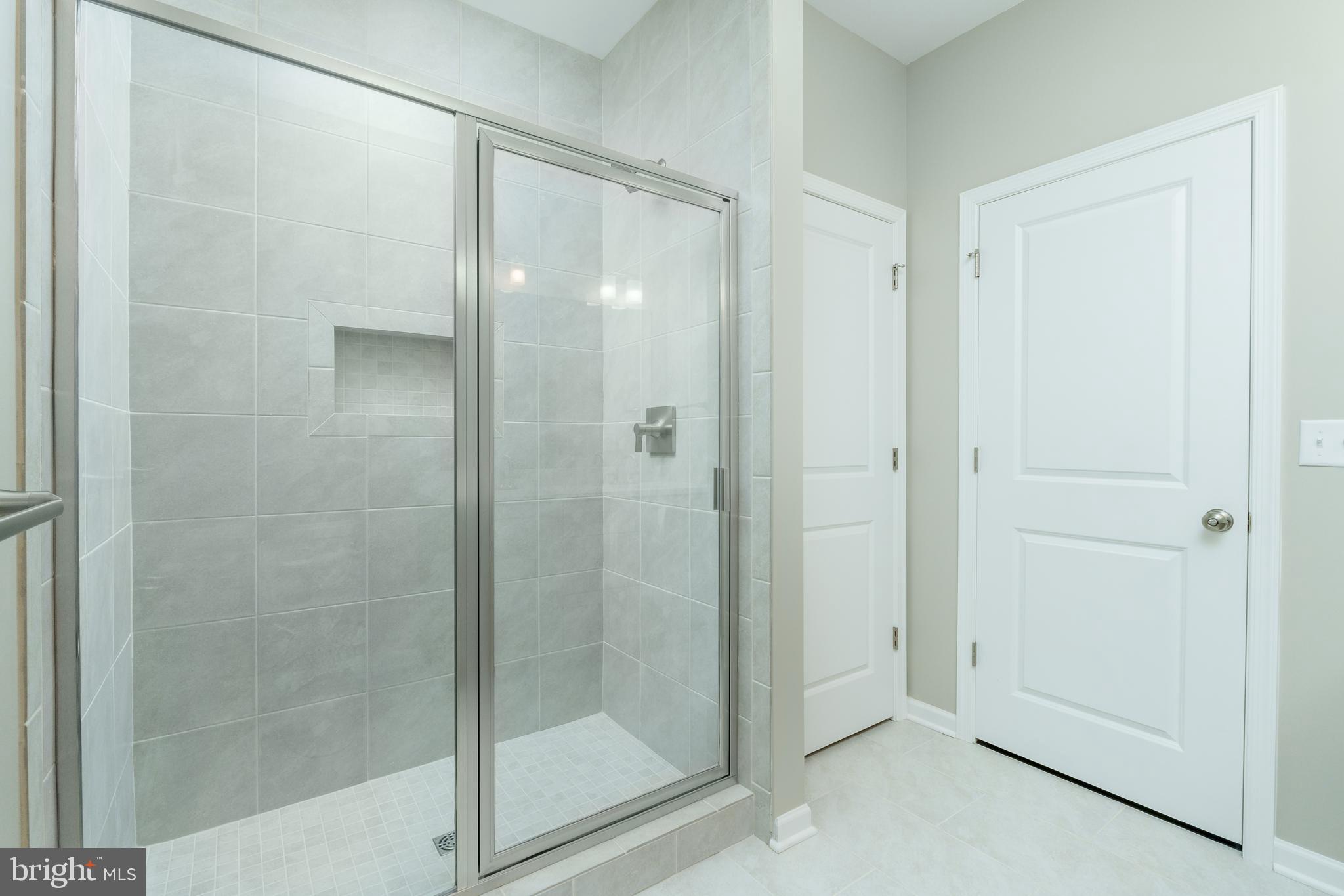 202 Phoebe Road Port Matilda, PA 16870 - Photo 34 of 52 a bathroom with a glass shower door
