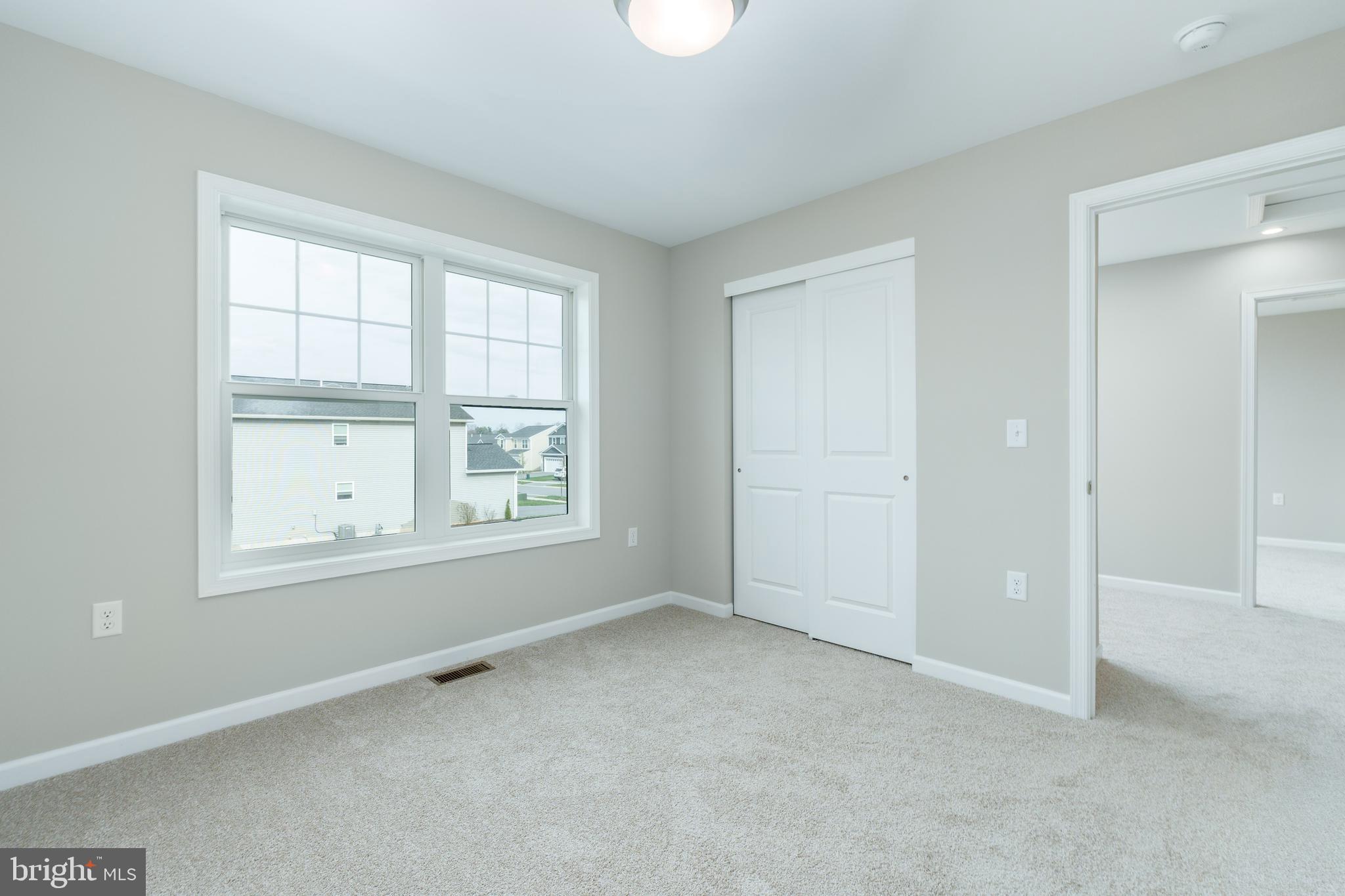202 Phoebe Road Port Matilda, PA 16870 - Photo 43 of 52 an empty room with windows
