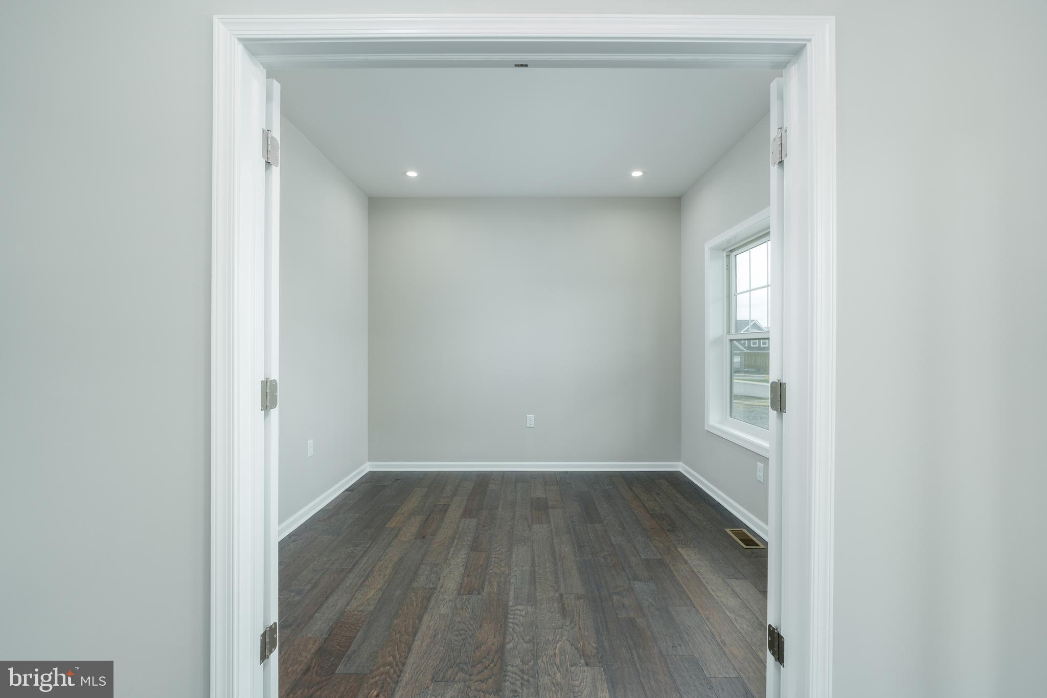 202 Phoebe Road Port Matilda, PA 16870 - Photo 5 of 52 a view of a room with wooden floor and windows