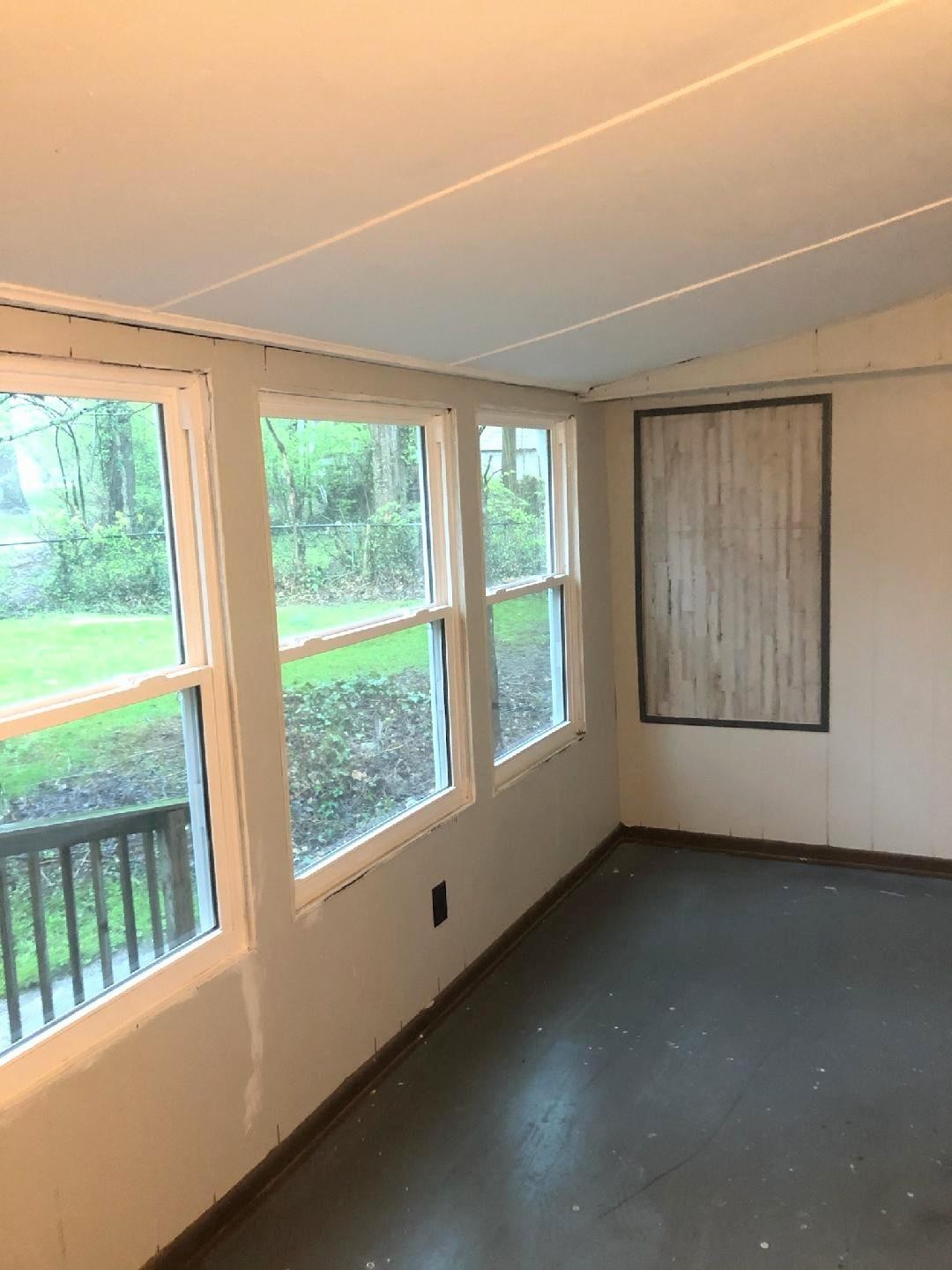 103 East Price Road Oak Ridge, TN 37830 - Photo 32 of 37 a view of an empty room with a window
