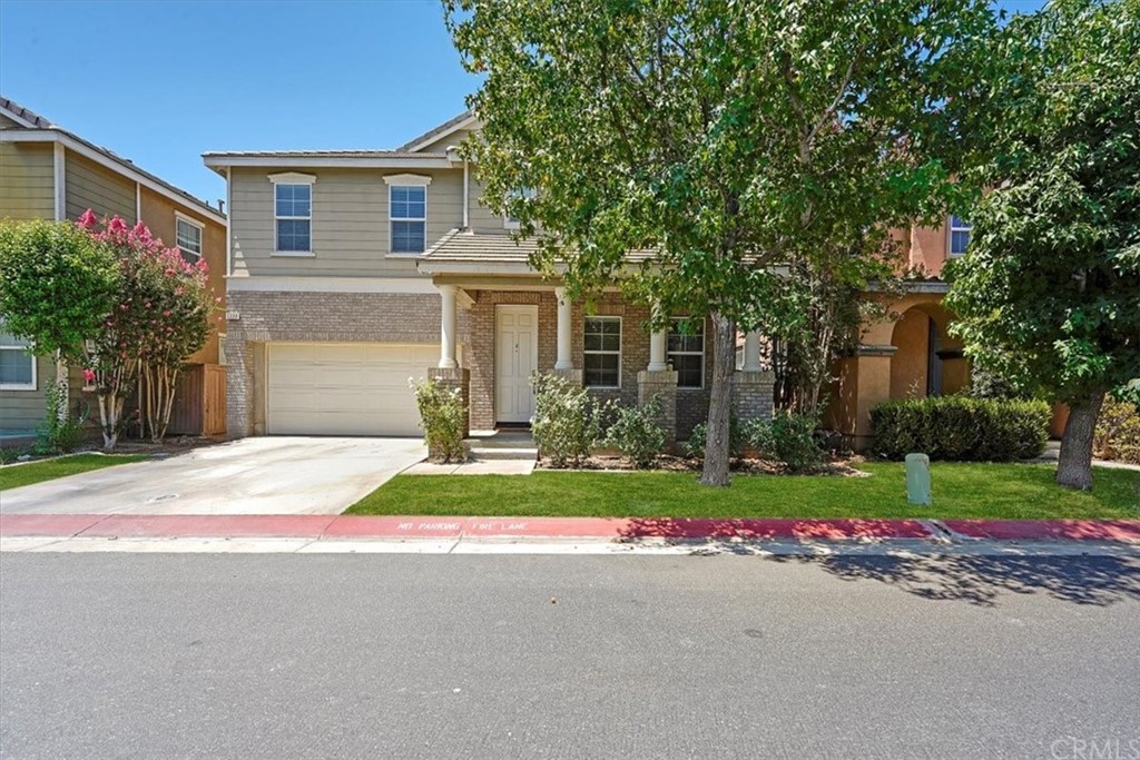 1777 Carrie Way Riverside, CA 92501 - Photo 2 of 35 a house view with a garden space