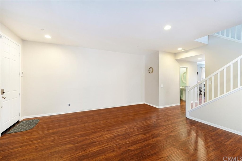 1777 Carrie Way Riverside, CA 92501 - Photo 22 of 35 a view of empty room with wooden floor