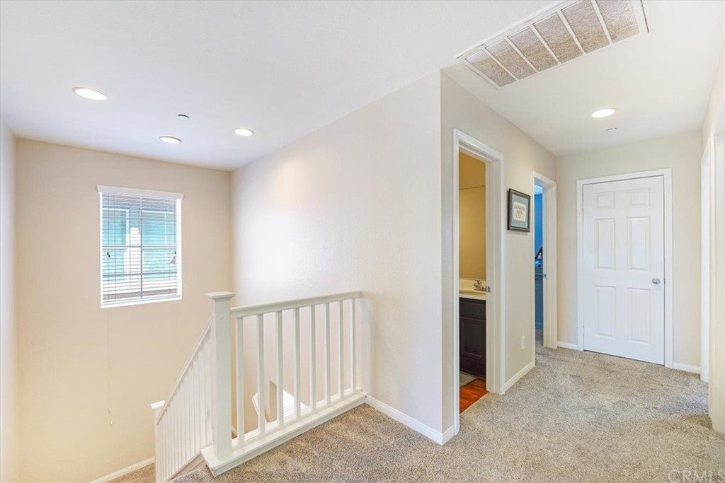 1777 Carrie Way Riverside, CA 92501 - Photo 24 of 35 a view of an entryway with wooden floor
