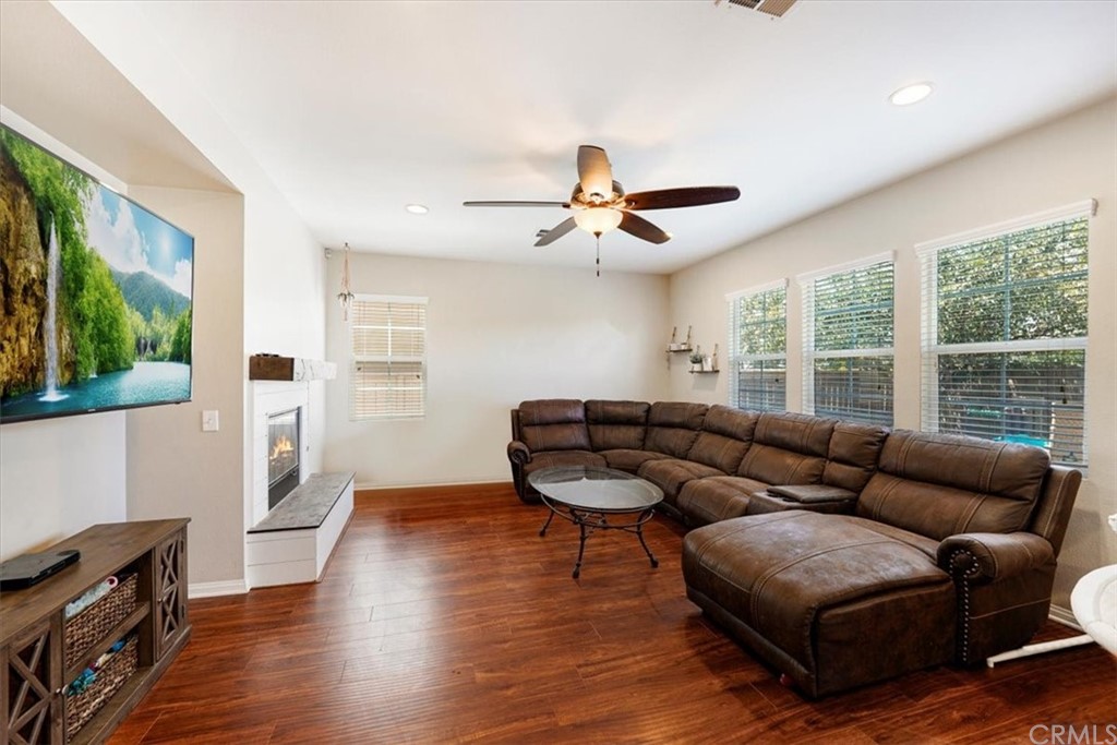 1777 Carrie Way Riverside, CA 92501 - Photo 25 of 35 a living room with furniture and a large window