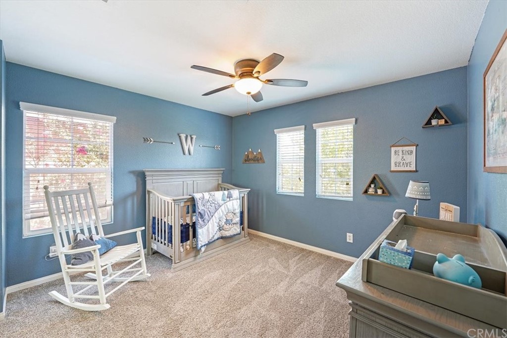 1777 Carrie Way Riverside, CA 92501 - Photo 10 of 35 a living room with furniture and a window