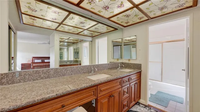 a bathroom with a shower and a shower curtain