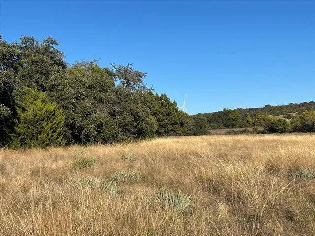 a view of lake with mountain