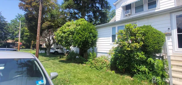 a view of a backyard with plants
