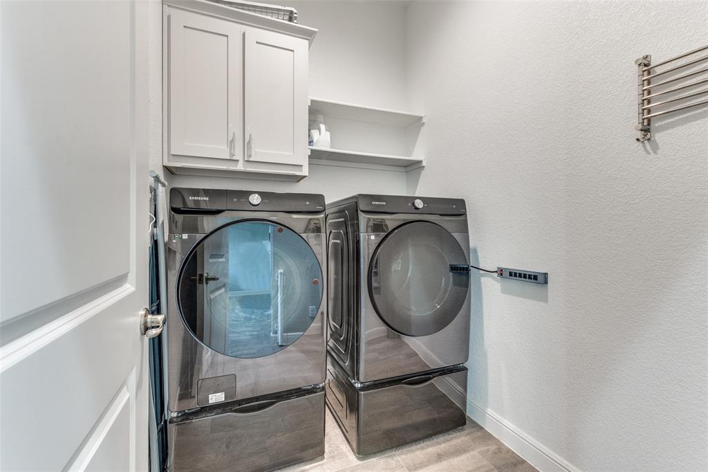 1829 Bellatrix Drive Haslet, TX 76052 - Photo 13 of 25 a utility room with dryer and washer