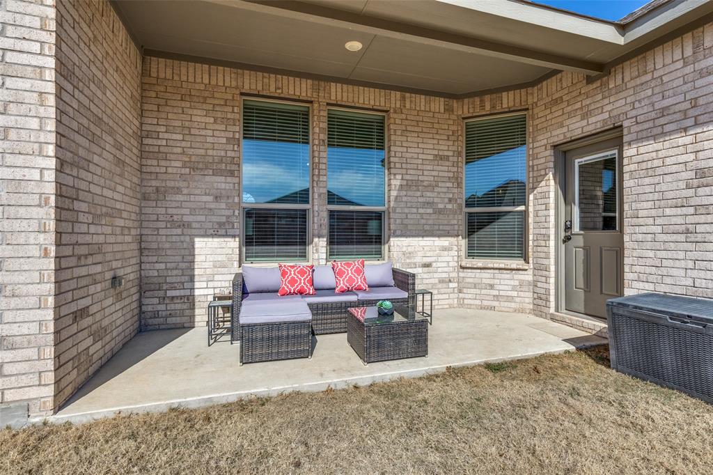 1829 Bellatrix Drive Haslet, TX 76052 - Photo 22 of 25 a backyard of a house with seating space