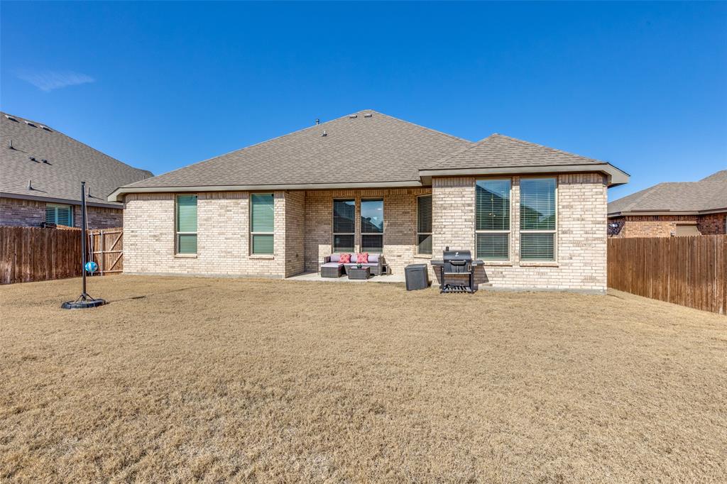 1829 Bellatrix Drive Haslet, TX 76052 - Photo 23 of 25 a house with yard in front of it