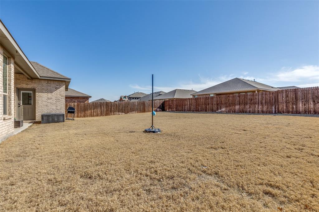 1829 Bellatrix Drive Haslet, TX 76052 - Photo 25 of 25 a view of a house with a snow in the yard