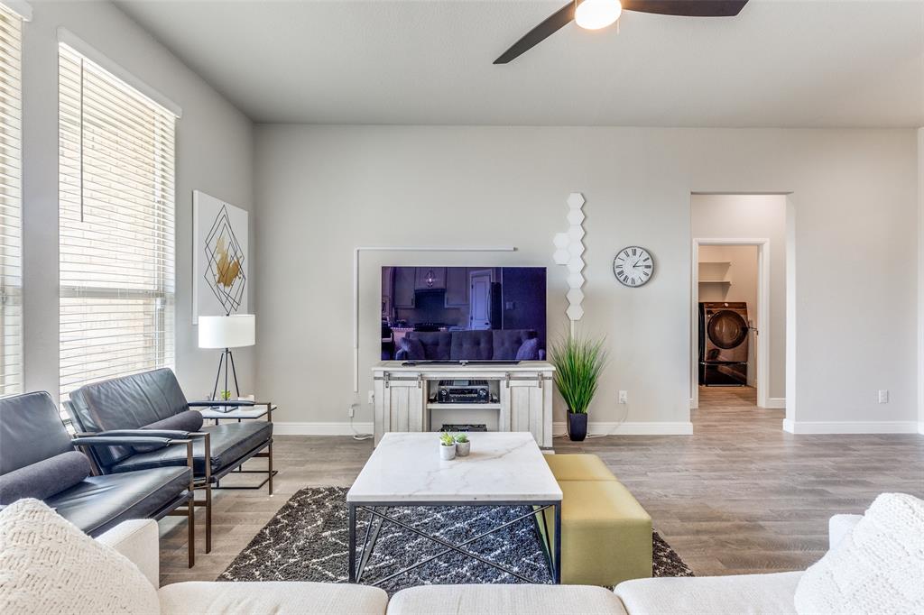 1829 Bellatrix Drive Haslet, TX 76052 - Photo 7 of 25 a living room with furniture and a flat screen tv