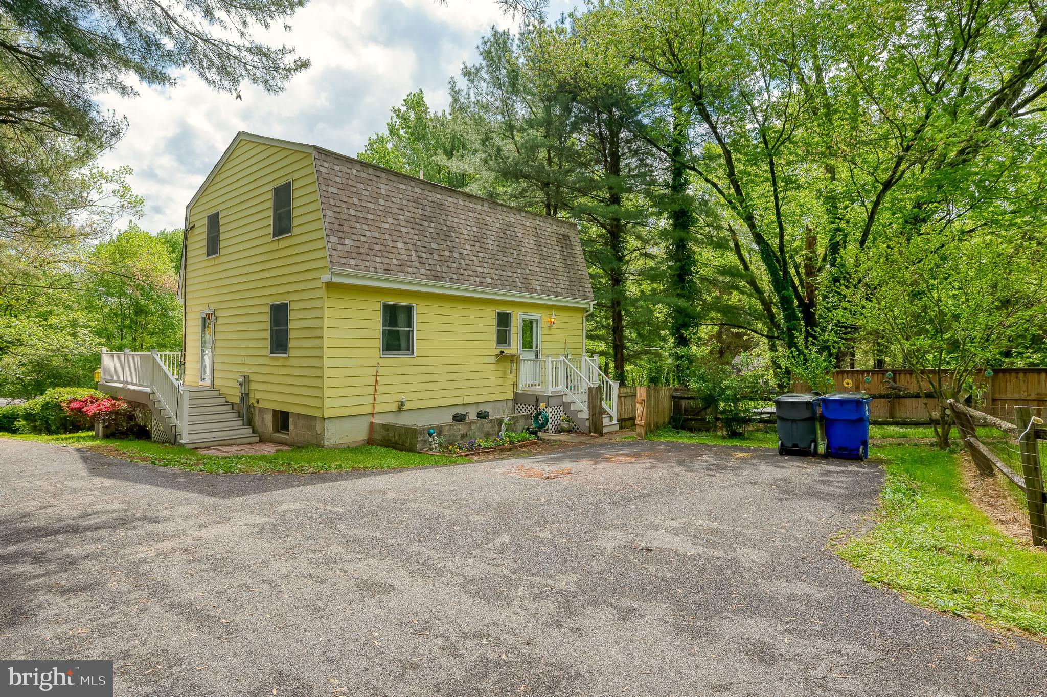 710 Magnolia Road Joppa, MD 21085 - Photo 49 of 58 a view of a house with a backyard and trees