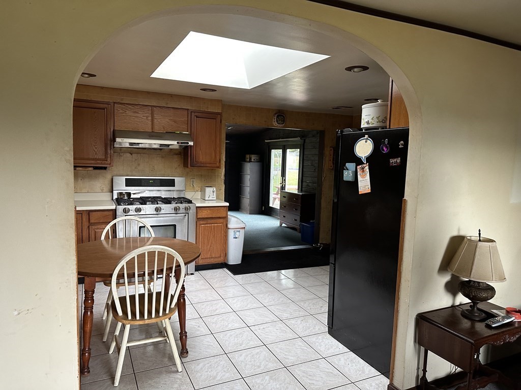 18 Seminole Road Dartmouth, MA 02748 - Photo 8 of 13 a kitchen with a sink cabinets and appliances