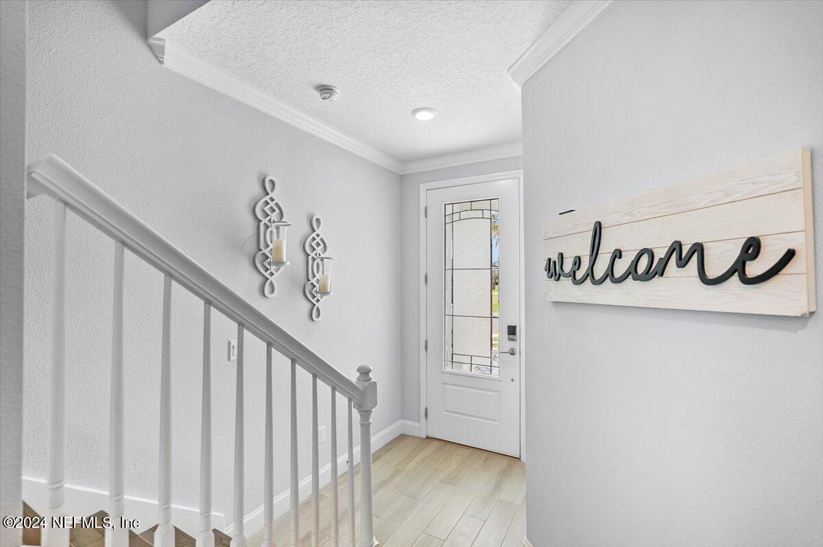 262 Clifton Bay Loop St. Johns, FL 32259 - Photo 15 of 57 a view of a hallway with stairs