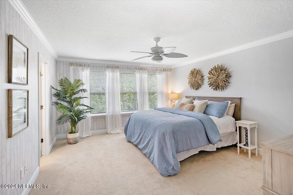 262 Clifton Bay Loop St. Johns, FL 32259 - Photo 19 of 57 a spacious bedroom with a bed and a window