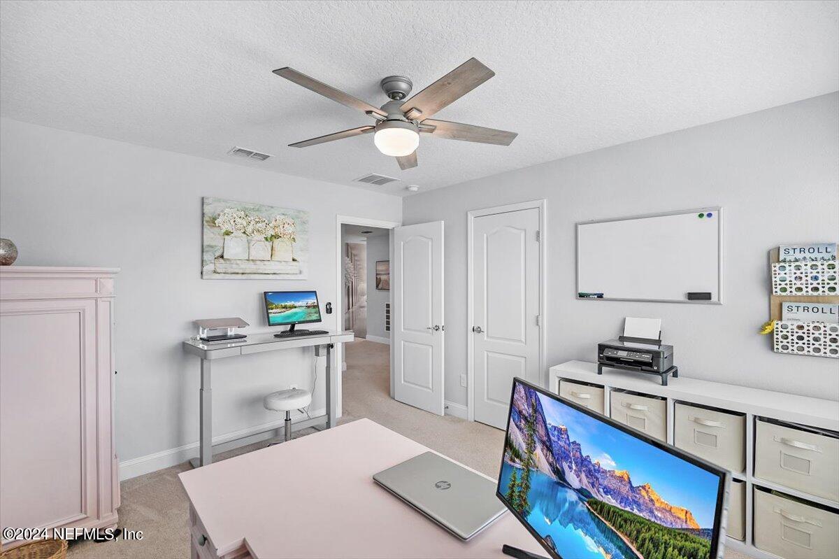 262 Clifton Bay Loop St. Johns, FL 32259 - Photo 25 of 57 a room with furniture and a window