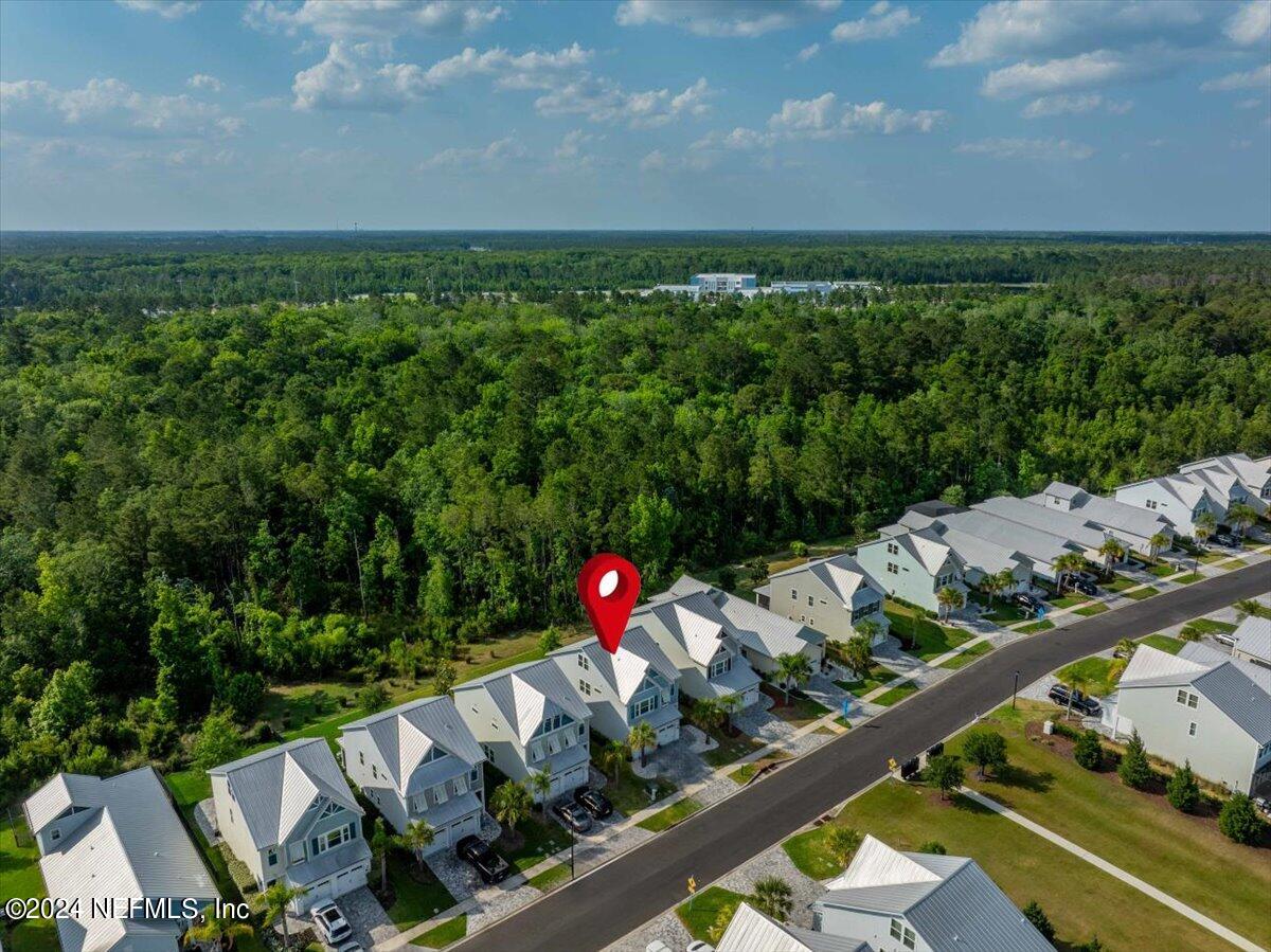 262 Clifton Bay Loop St. Johns, FL 32259 - Photo 38 of 57 an aerial view of a house with a yard