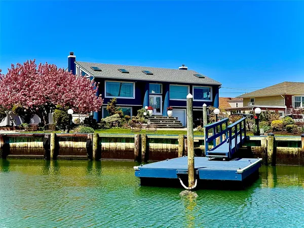 a view of swimming pool with outdoor seating