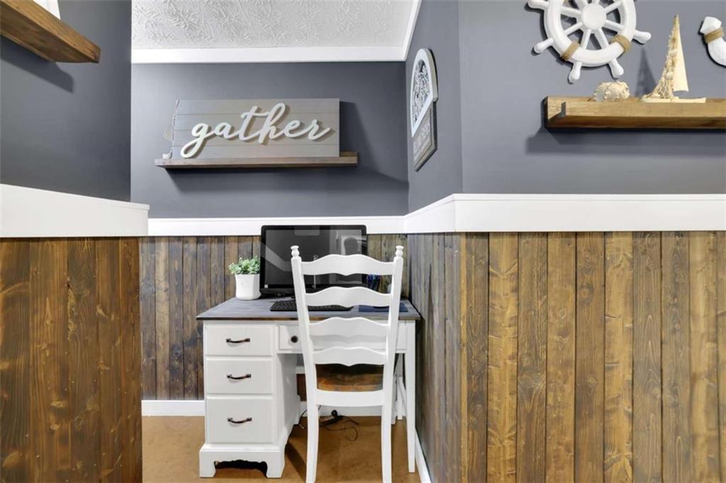 2932 Lake Hollow Road Gainesville, GA 30501 - Photo 48 of 68 a bedroom with a bed and a table