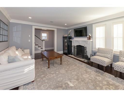 39 Rangeley Road Newton, MA 02465 - Photo 6 of 16 a living room with furniture and a fireplace