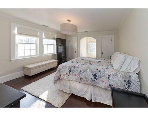 39 Rangeley Road Newton, MA 02465 - Photo 8 of 16 a bedroom with a bed and a large window