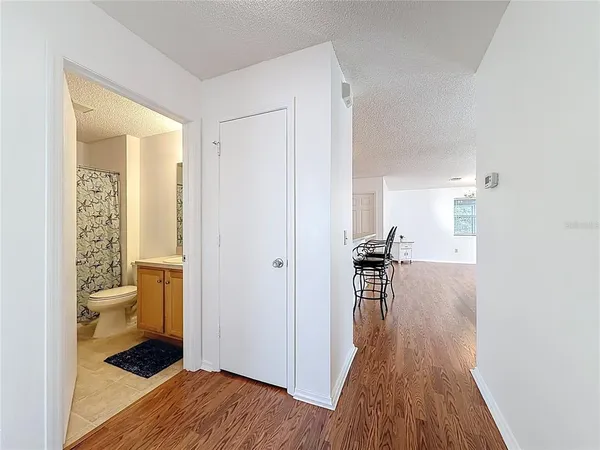 a bathroom with a sink toilet and mirror