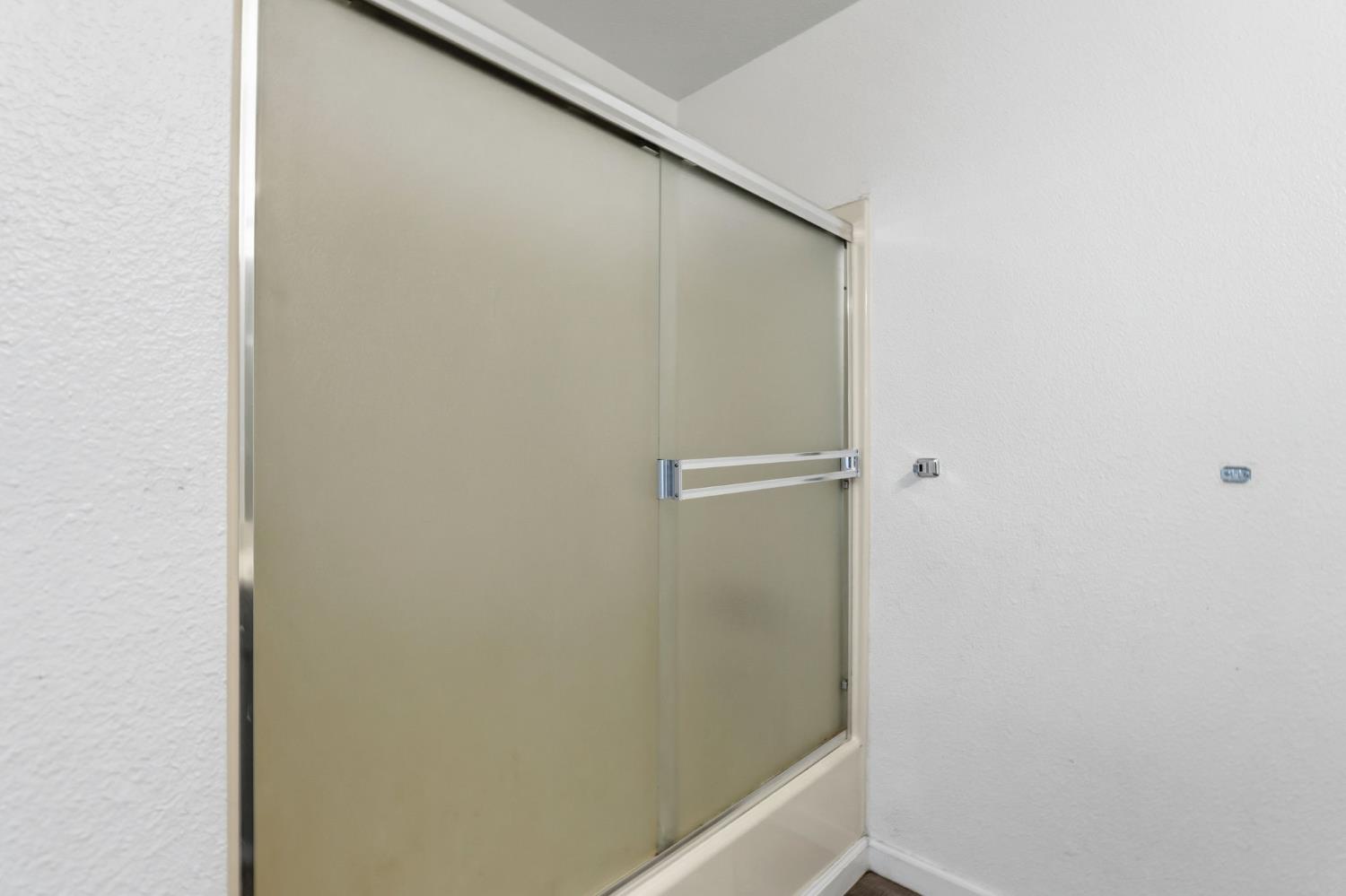 50 North 19th Avenue, Unit AF Lemoore, CA 93245 - Photo 19 of 40 a bathroom with a shower