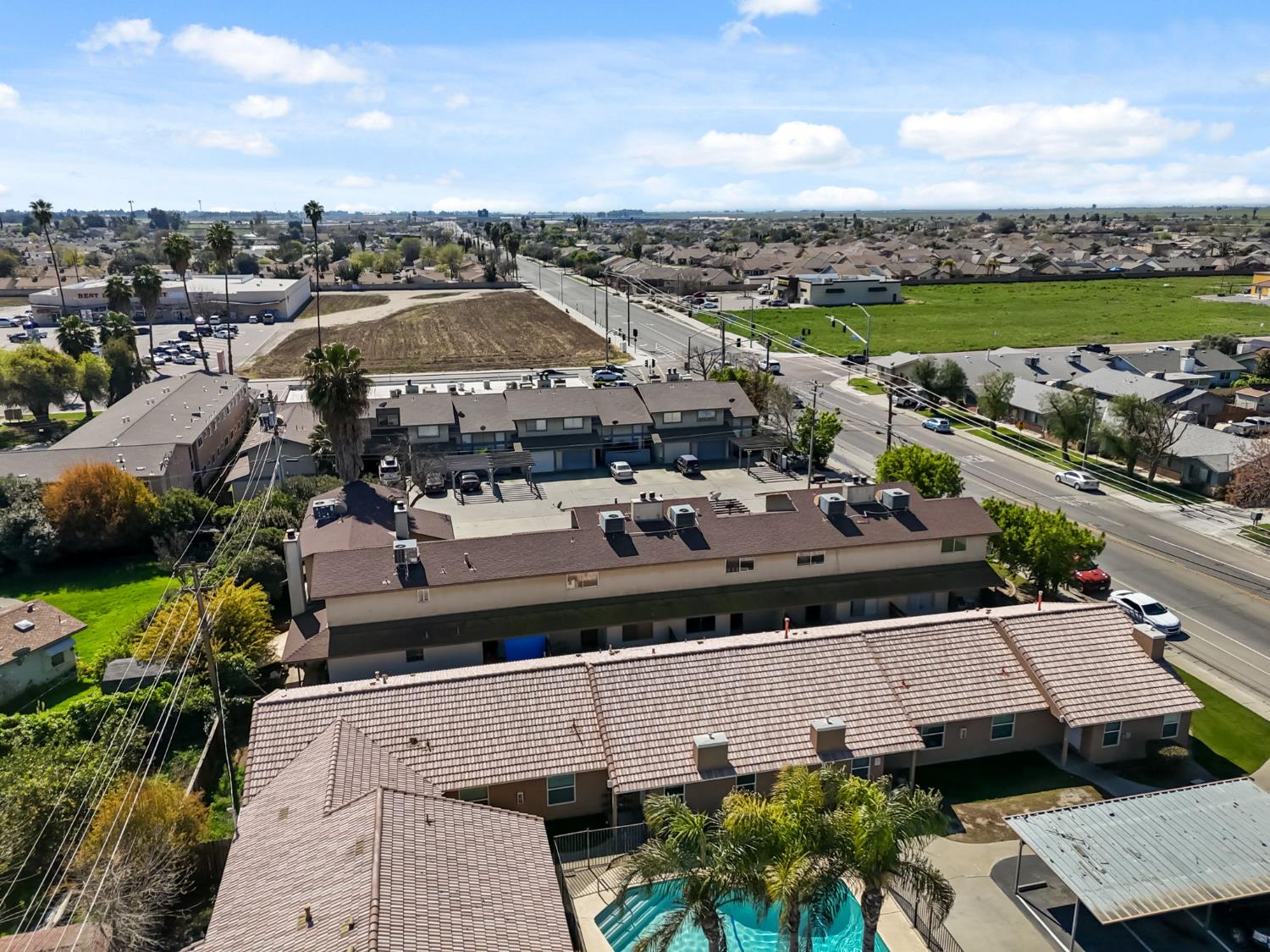50 North 19th Avenue, Unit AF Lemoore, CA 93245 - Photo 36 of 40 an aerial view of a house with a garden